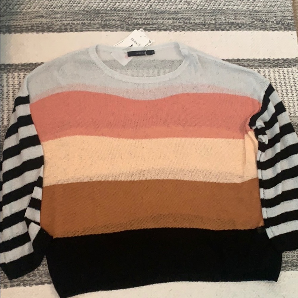 Light weight breathable stripped colorful sweater.